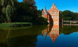 Exploring the Moated Palaces and Castles of Münsterland on Two Wheels with a Camera in Hand