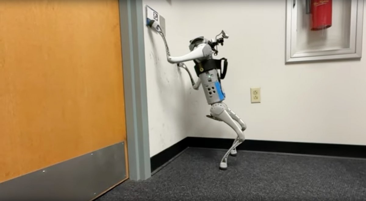 Robotic dog uses front legs to manipulate objects