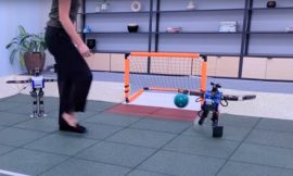 Fluid-Motion Humanoid Robots Engage in Soccer Game