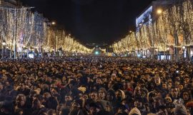 Hundreds of thousands of people celebrate the new year on the Champs-Elysées